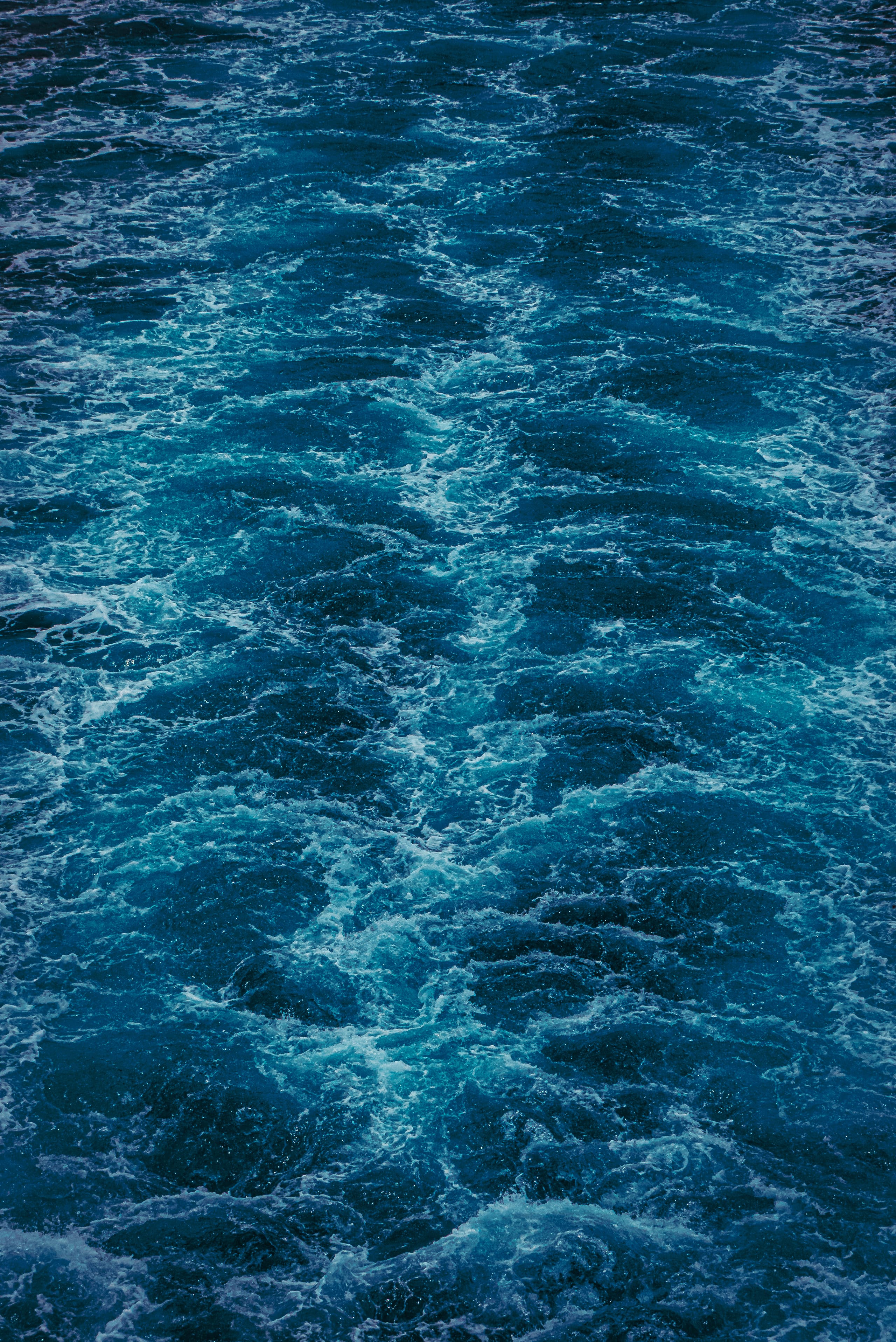 A field of churning blue-white water filling the frame.